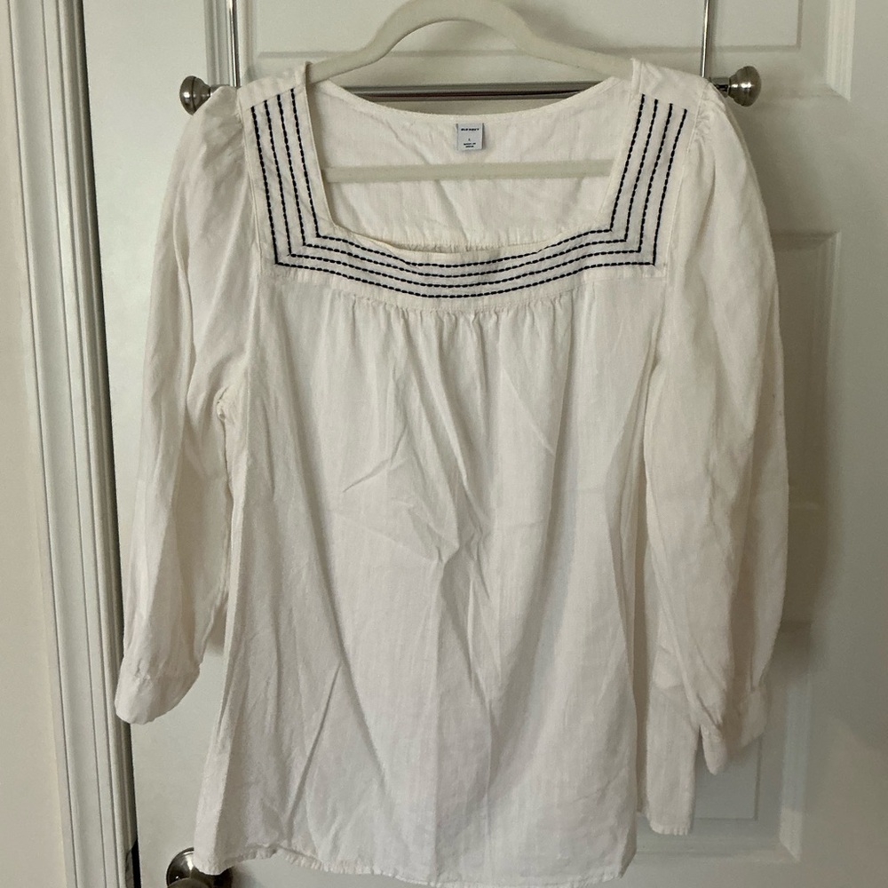 White Blouse with Black Accents